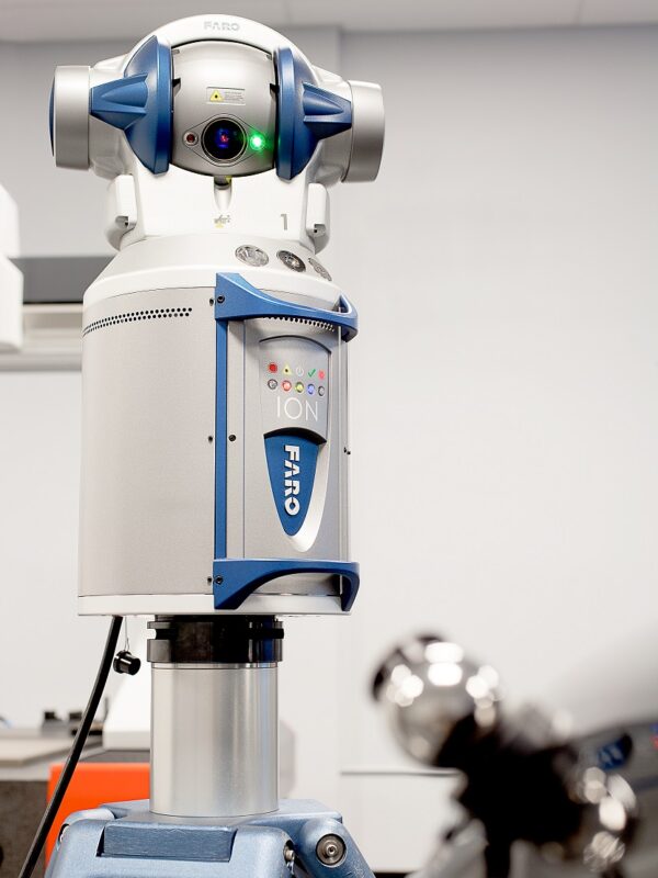 Faro Ion laser tracker set up in the lab to perform dimensional inspection services