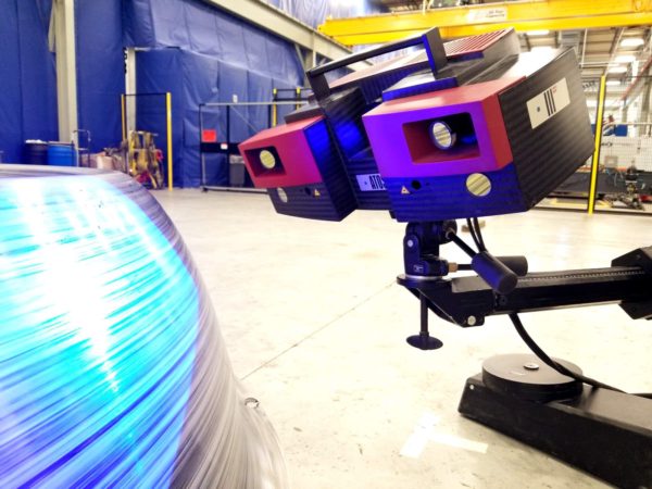 A non-contact structured light 3D scanner doing contract inspection services on-site