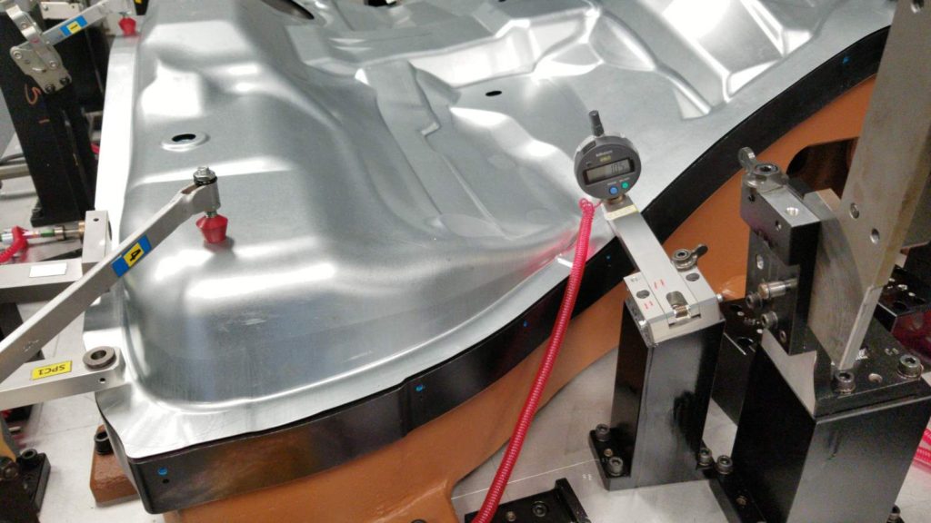 A gage r&r study being performed on a fixture in the automotive industry